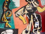a painting on the wall of a room with a painting on the wall