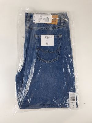the back of a pair of blue jeans wrapped in plastic