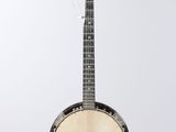 an old banjo with a wooden neck and a white background