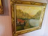 a picture of a painting hanging on the wall