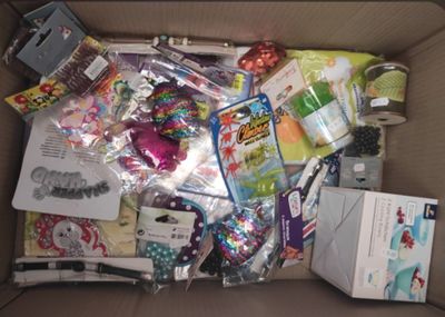 a cardboard box filled with lots of different items