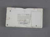 a white electronic device that is sitting on a table