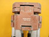 a close up of a drill head on a yellow background