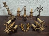 five candles that are sitting on a wooden table