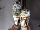 two salt and pepper shakers in the hand of a person