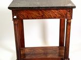a small table with a marble top on it