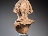 an image of a sculpture of a woman ' s head on a pedestal