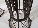 a metal table with a bunch of spoons on top of it