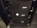 several suitcases are stacked on top of each other in a room