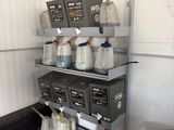 a picture of a commercial coffee machine in a garage