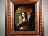 a painting of a woman holding a child in a wooden frame
