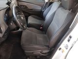 a picture of the interior of a car with a steering wheel