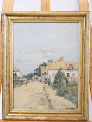 une image représentant un tableau posé sur un chevalet, sur lequel est représenté un village