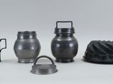 four different items that are sitting on a white surface