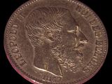 une vieille pièce de monnaie sur laquelle figure le visage d'une femme