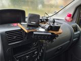 a car dashboard with a radio and other electronics on it