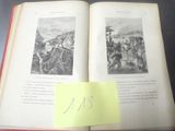 un livre ouvert sur lequel est collé un autocollant jaune
