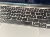 a close up of a laptop with a keyboard on it