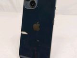 a close up of an iphone that is on a stand