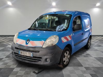 a small blue van that is parked in a room