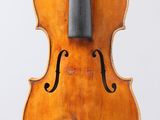 an old violin with a bow on a white background