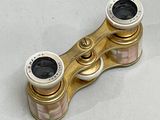 a pair of binoculars that are sitting on a table