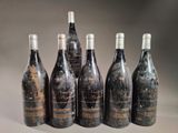 six bottles of wine are lined up in a row