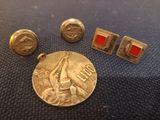 three gold and red enamel cufflinks and a silver coin