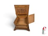 a small wooden box with a lid open on a white background
