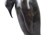 statue of a penguin on a white background with a white background