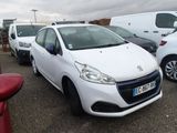 a white car that is parked in a parking lot
