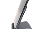 a phone that is sitting on top of a stand