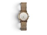 a close up of a wrist watch on a white surface