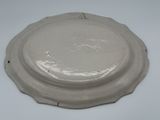 a white plate that is sitting on a table