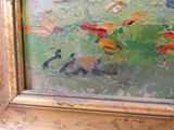 une photo d'un tableau accroché au mur