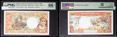 two different types of currency are on display in a display case