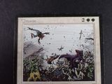 a picture of a card with a picture of a dragon on it