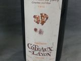 a bottle of wine that is sitting on a table