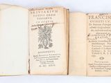 an open book with a picture of a plant on it