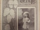 une vieille photo d'une petite fille en robe et avec un chapeau