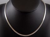 a close up of a necklace on a mannequin mannequin mannequin mannequin mannequin mannequin mannequin mannequin