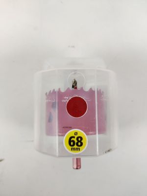 une photo d'une brosse à dents rose avec un point rouge dessus