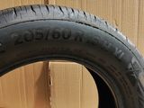 a close up of a tire on a cardboard box on a floor