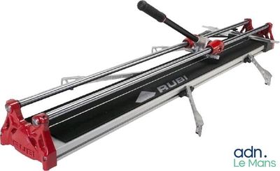 a close up of a manual tile cutter on a white background