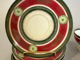 many plates stacked on top of each other on a table