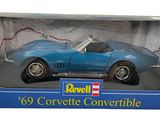 the box is open to show the model of a blue sports car