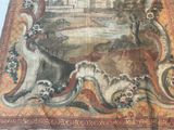 a picture of a rug with a picture of a castle on it