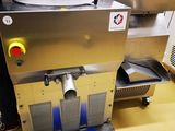 a machine that is sitting on a counter in a kitchen
