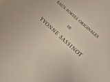 a close up of a book with a black and white cover