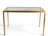 une photo d'une table en verre avec des pieds dorés et un plateau en verre